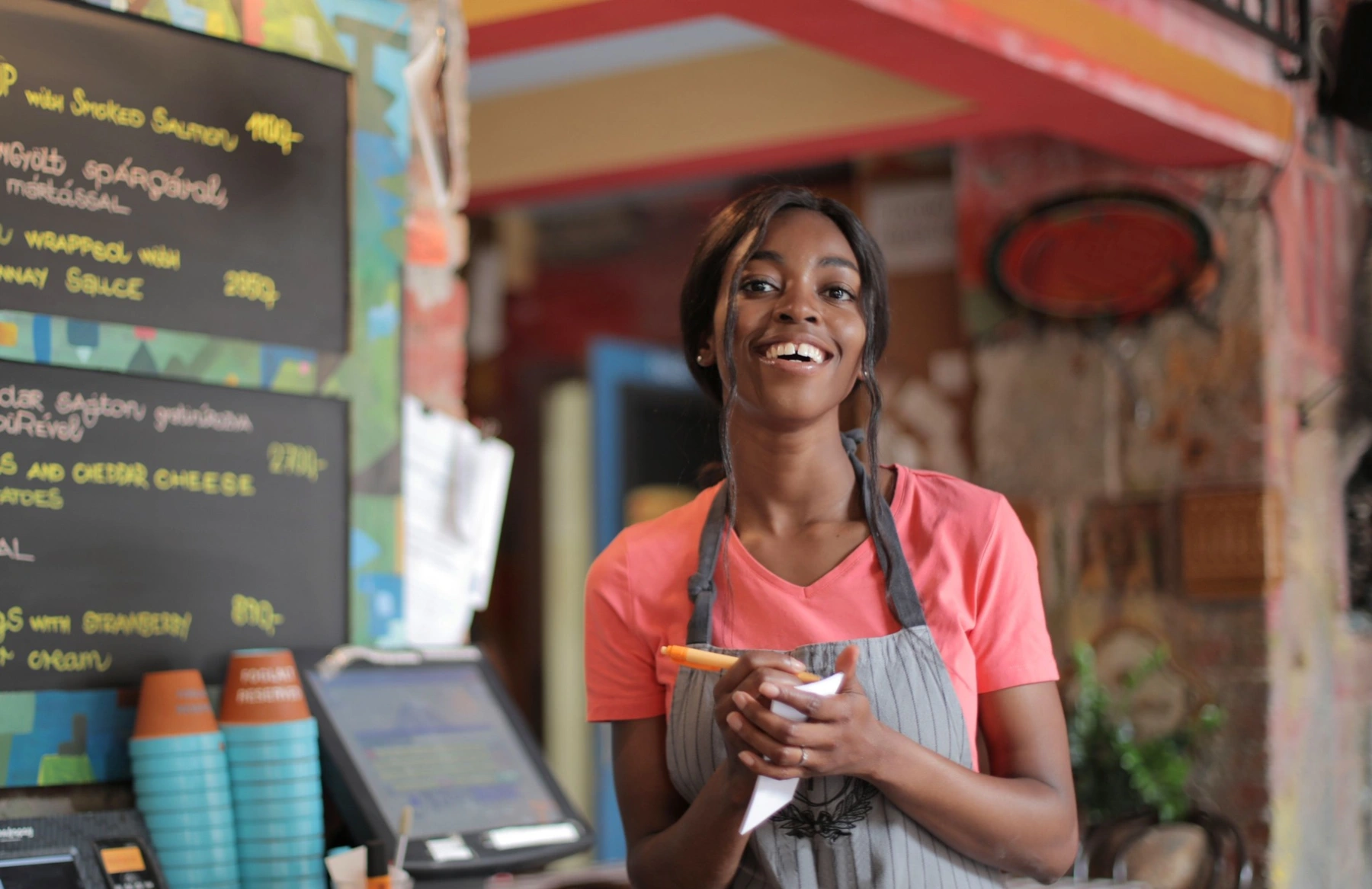 Shop owner in her café